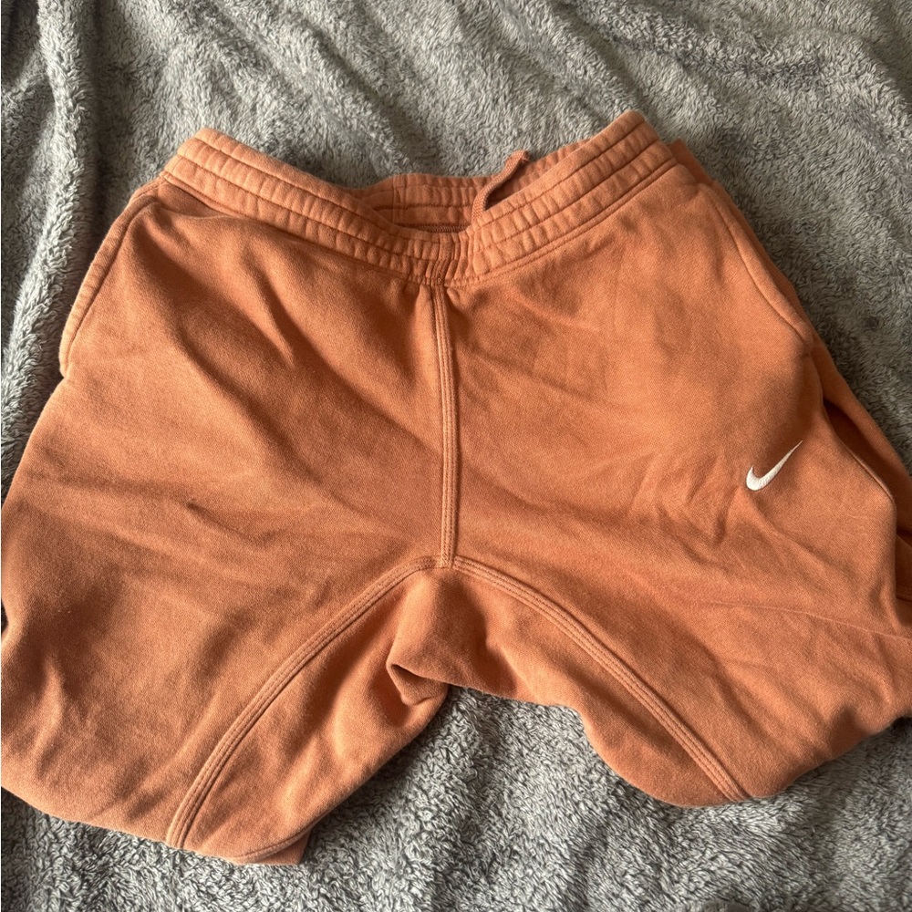 men’s orange nike joggers